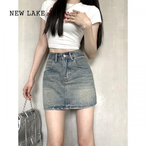 NEW LAKE蓝色牛仔半身裙女新款高腰显瘦辣妹防走质包臀A字短裙子